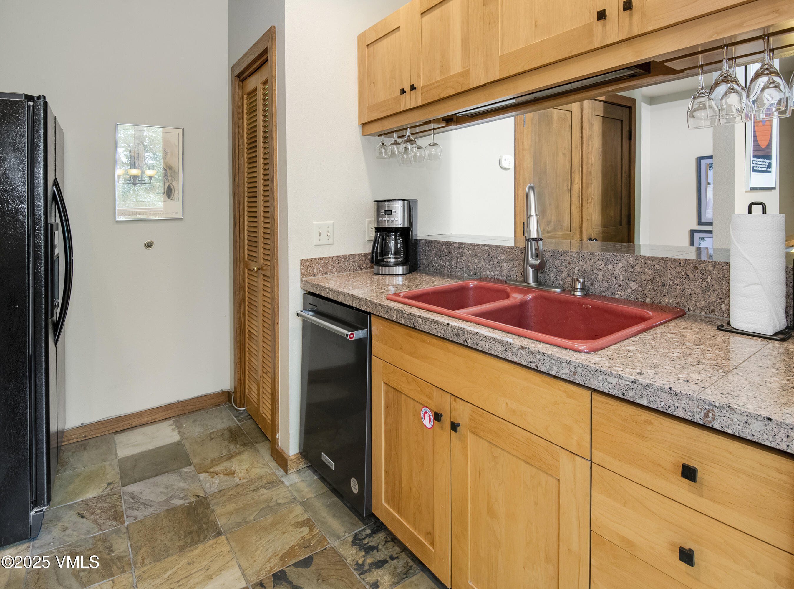 1360 Westhaven Drive, Unit 5A Vail, CO 81657 - Photo 17 of 60 a bathroom with a sink and a mirror