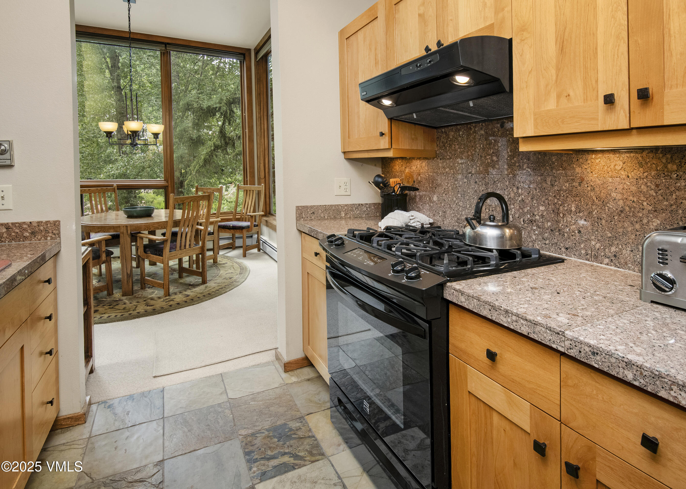1360 Westhaven Drive, Unit 5A Vail, CO 81657 - Photo 19 of 60 a kitchen with a stove and a sink