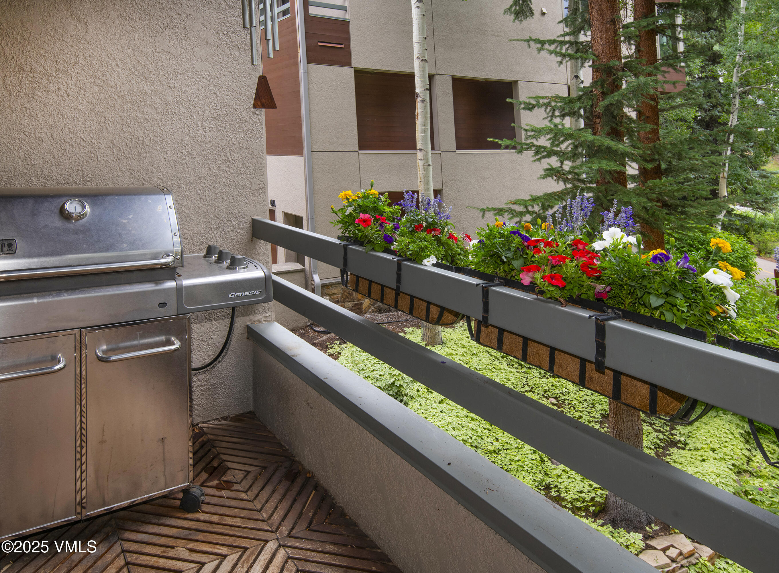 1360 Westhaven Drive, Unit 5A Vail, CO 81657 - Photo 23 of 60 a bunch of flowers sitting in a balcony