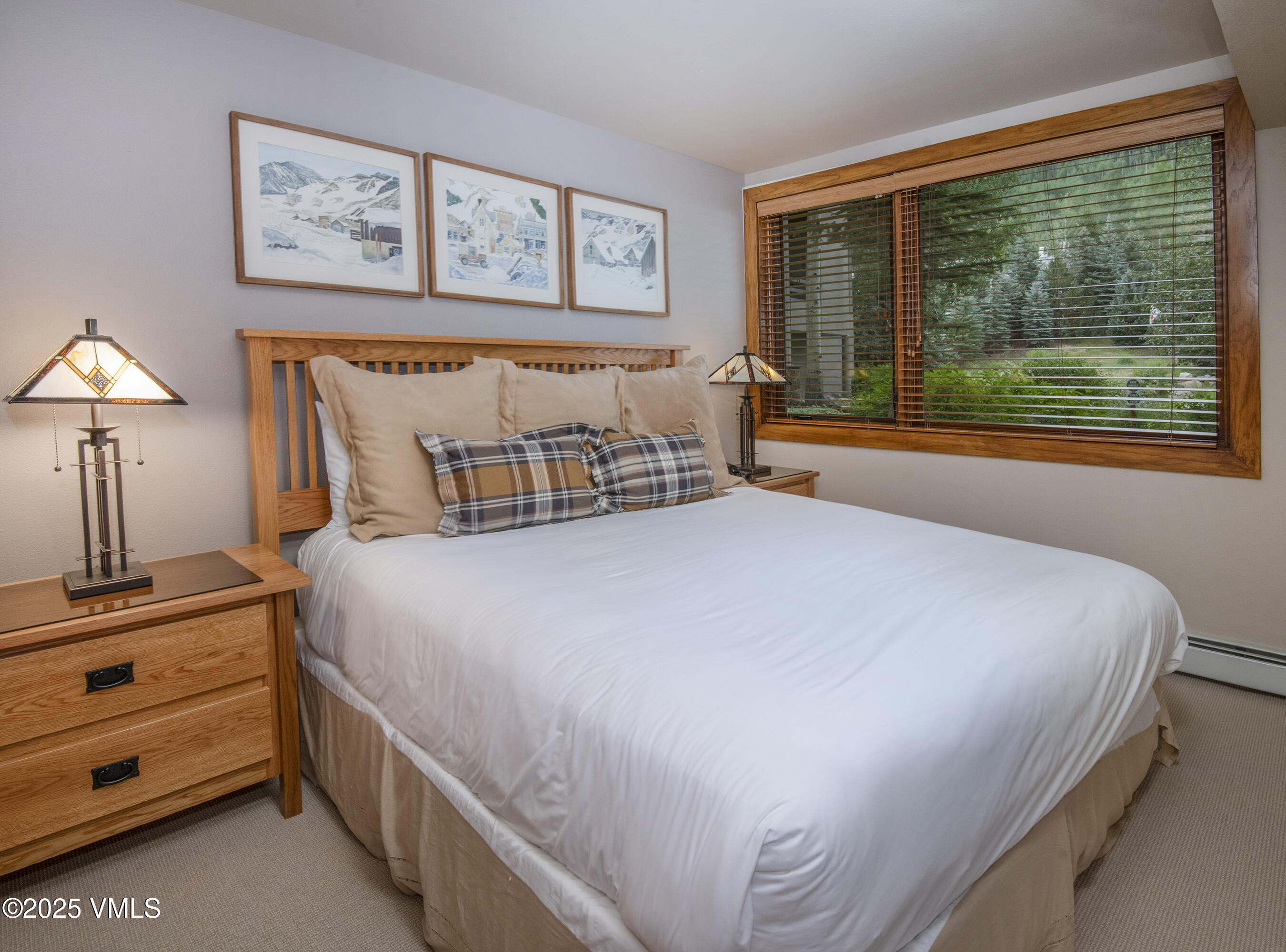 1360 Westhaven Drive, Unit 5A Vail, CO 81657 - Photo 29 of 60 a bedroom with a bed and a window
