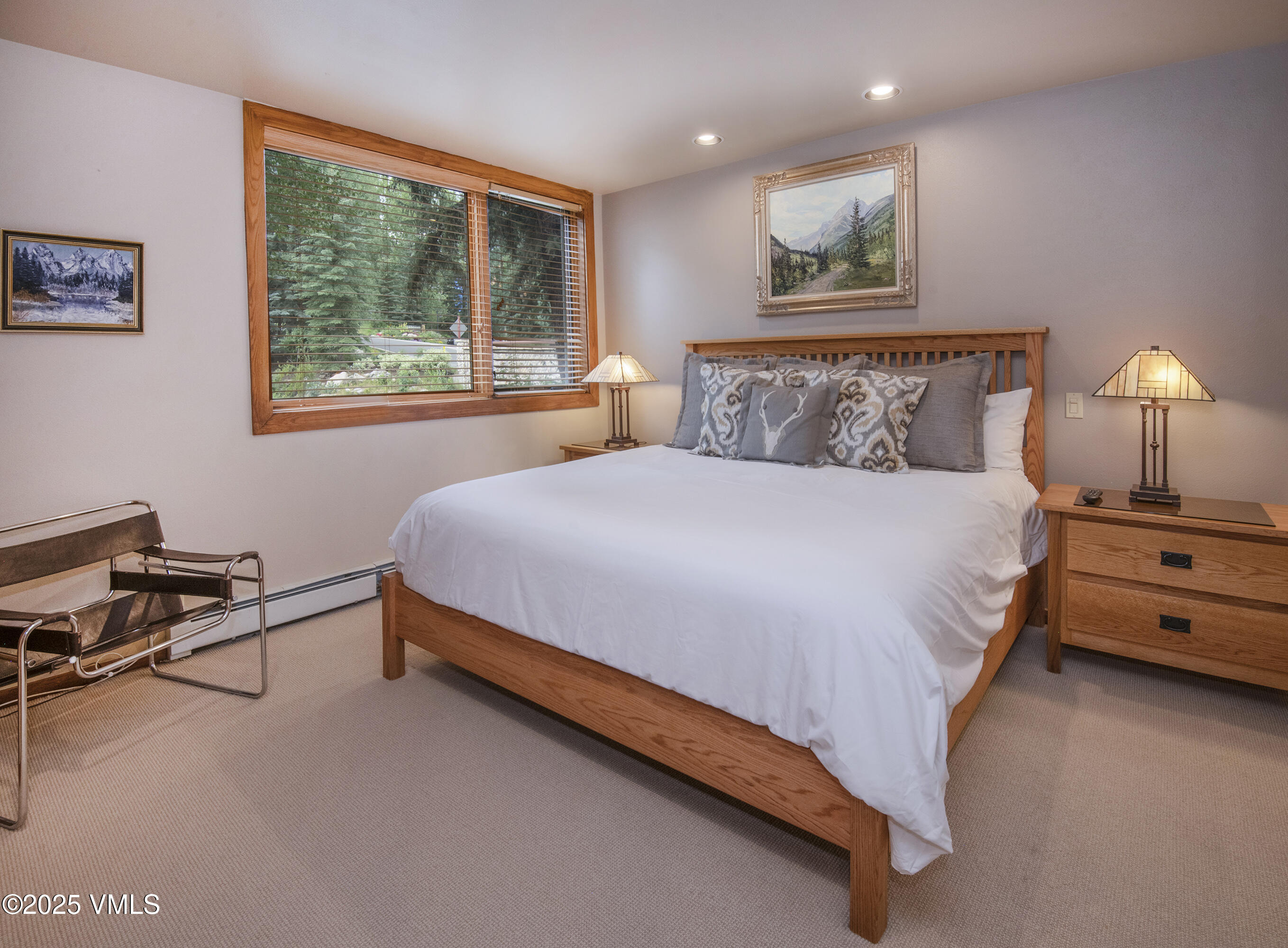 1360 Westhaven Drive, Unit 5A Vail, CO 81657 - Photo 32 of 60 a bedroom with a bed and a window