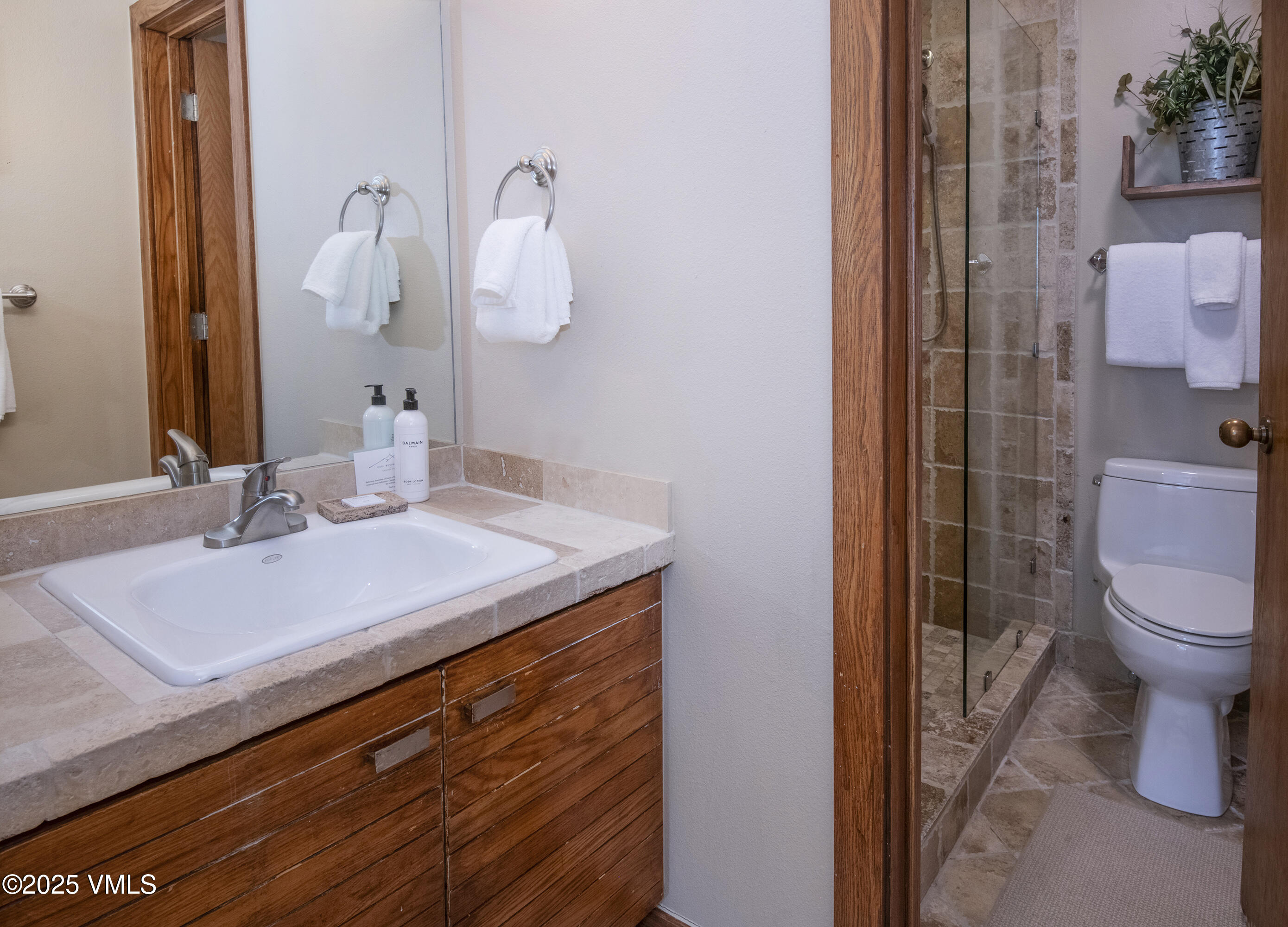1360 Westhaven Drive, Unit 5A Vail, CO 81657 - Photo 35 of 60 a bathroom with a sink and a toilet