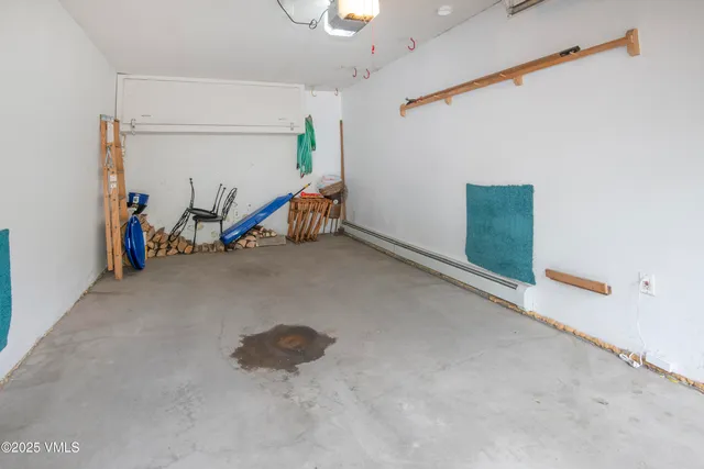 a front view of a house with a yard and sitting area