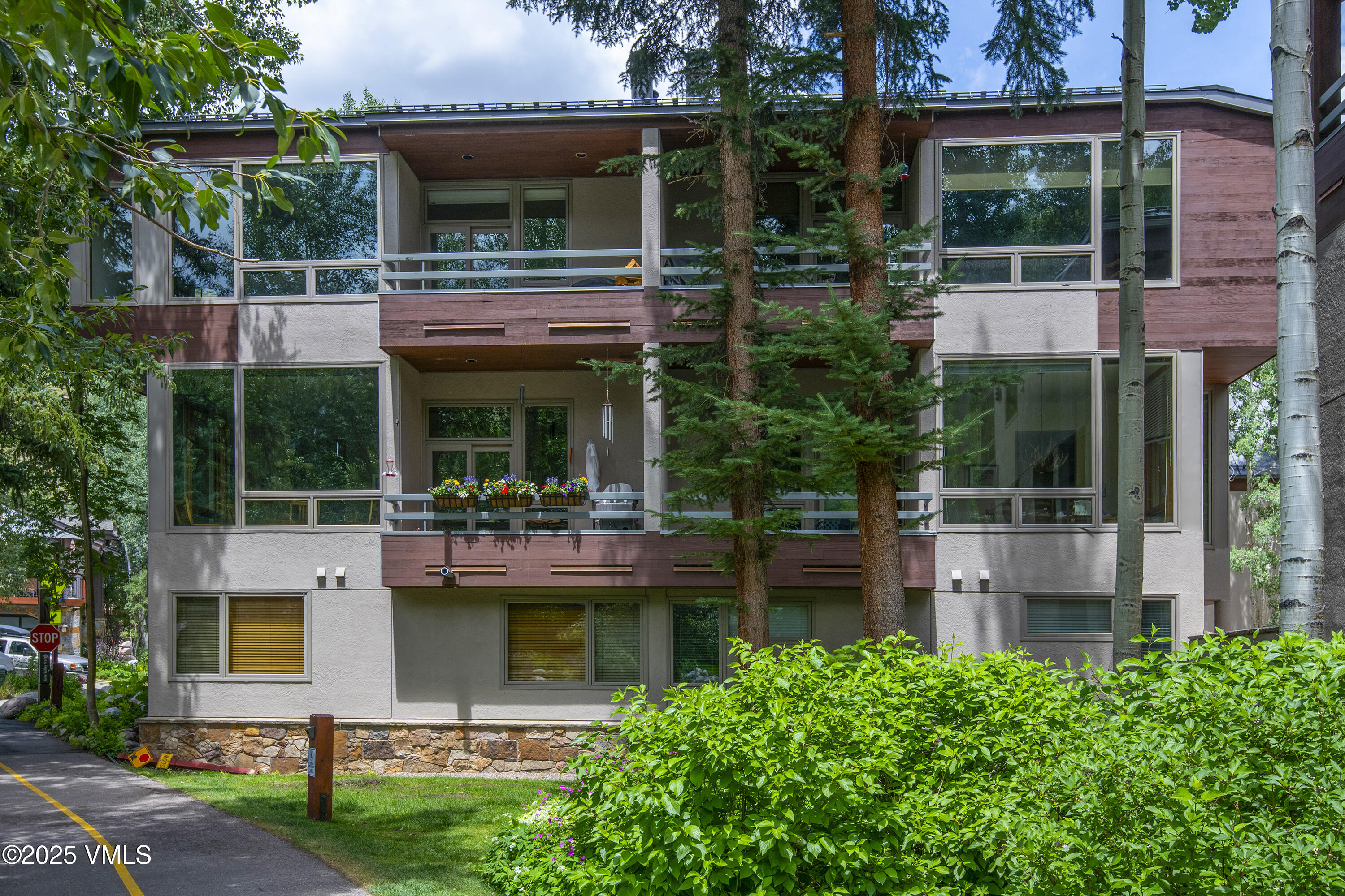 1360 Westhaven Drive, Unit 5A Vail, CO 81657 - Photo 47 of 60 a view of house with a yard and sitting area