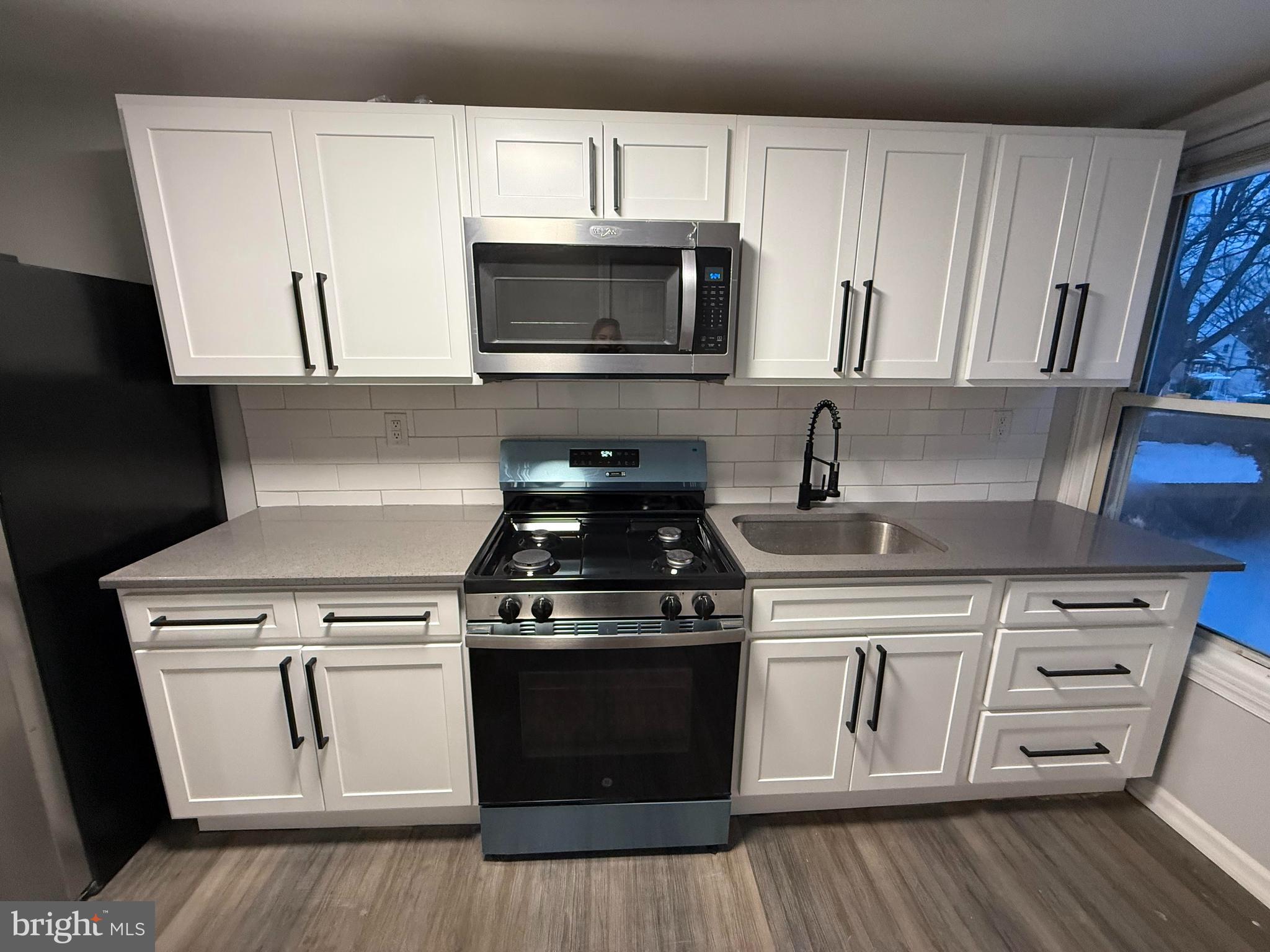 212 Warren Street, Unit 2 Beverly, NJ 08010 - Photo 1 of 33 Kitchen with Countertops, Stainless Appliances