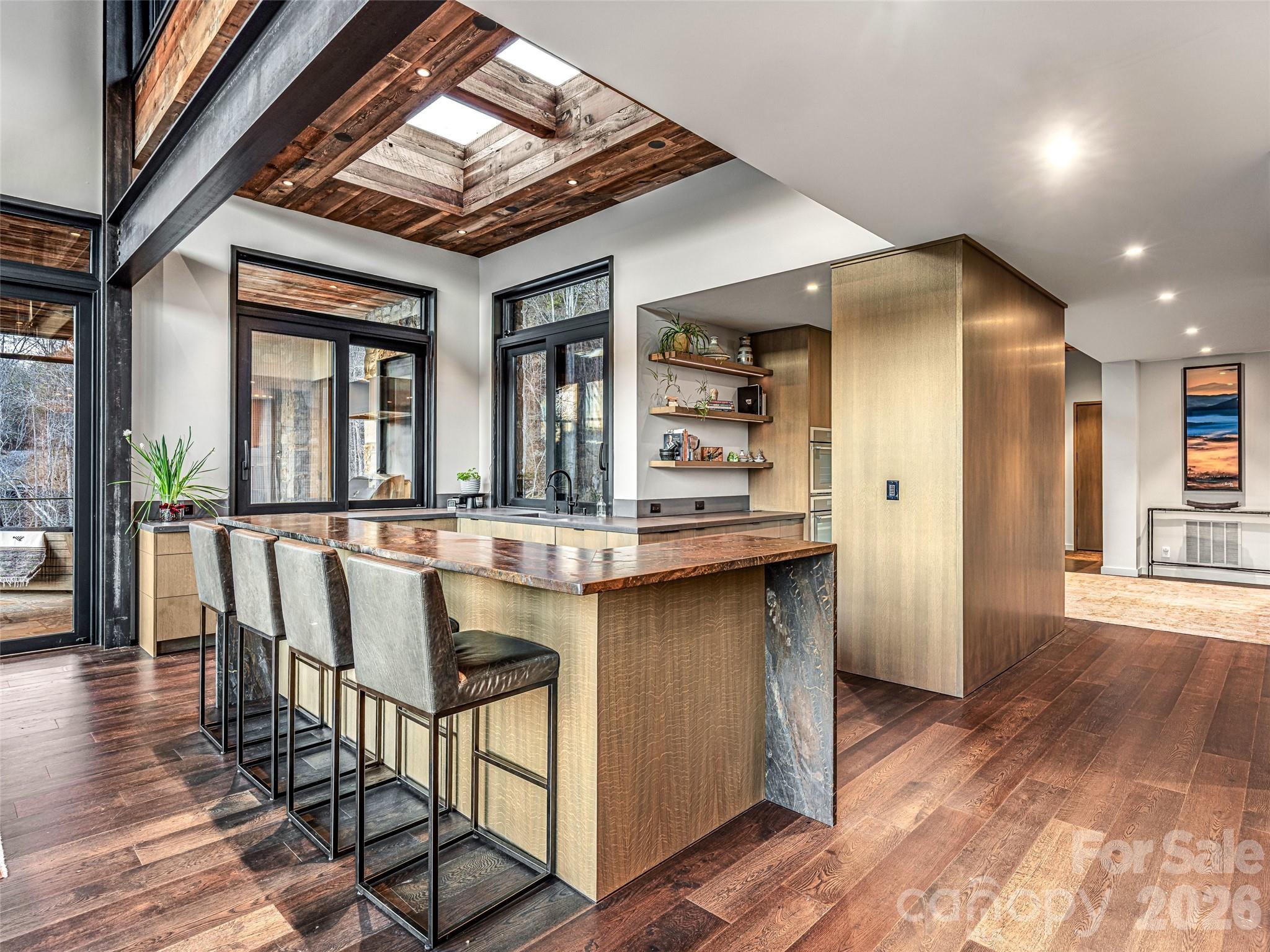 112 Moon Shadow Lane Marshall, NC 28753 - Photo 18 of 48 a dining hall with stainless steel appliances granite countertop a stove and a refrigerator