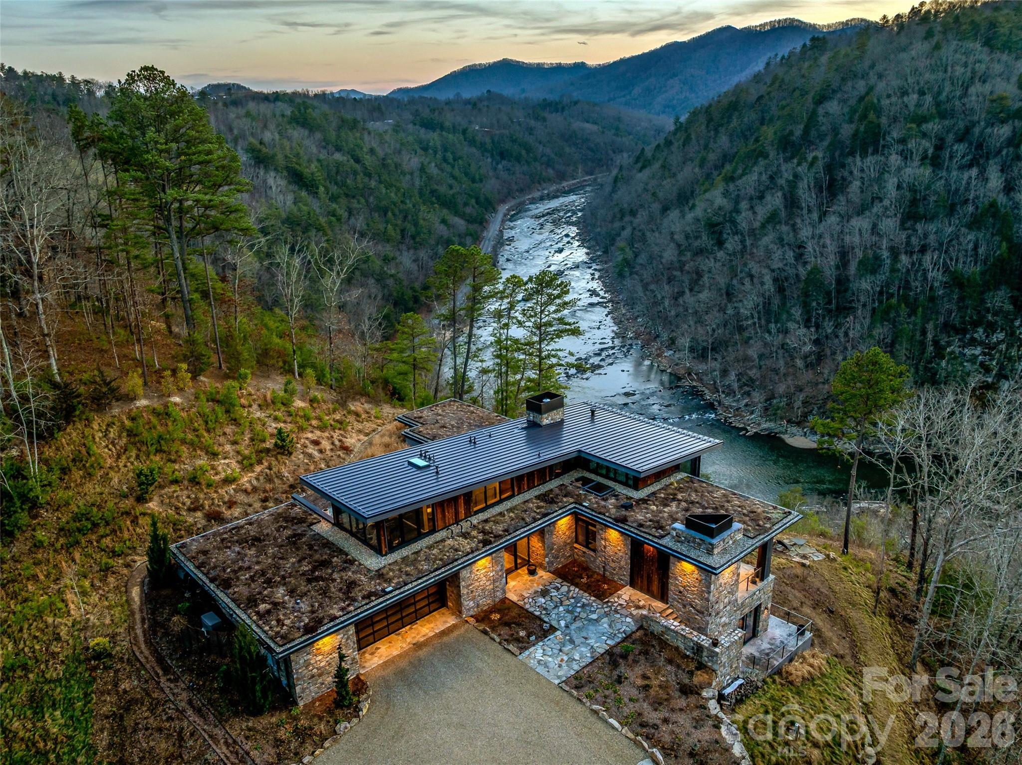 112 Moon Shadow Lane Marshall, NC 28753 - Photo 2 of 48 an aerial view of a house with mountain view
