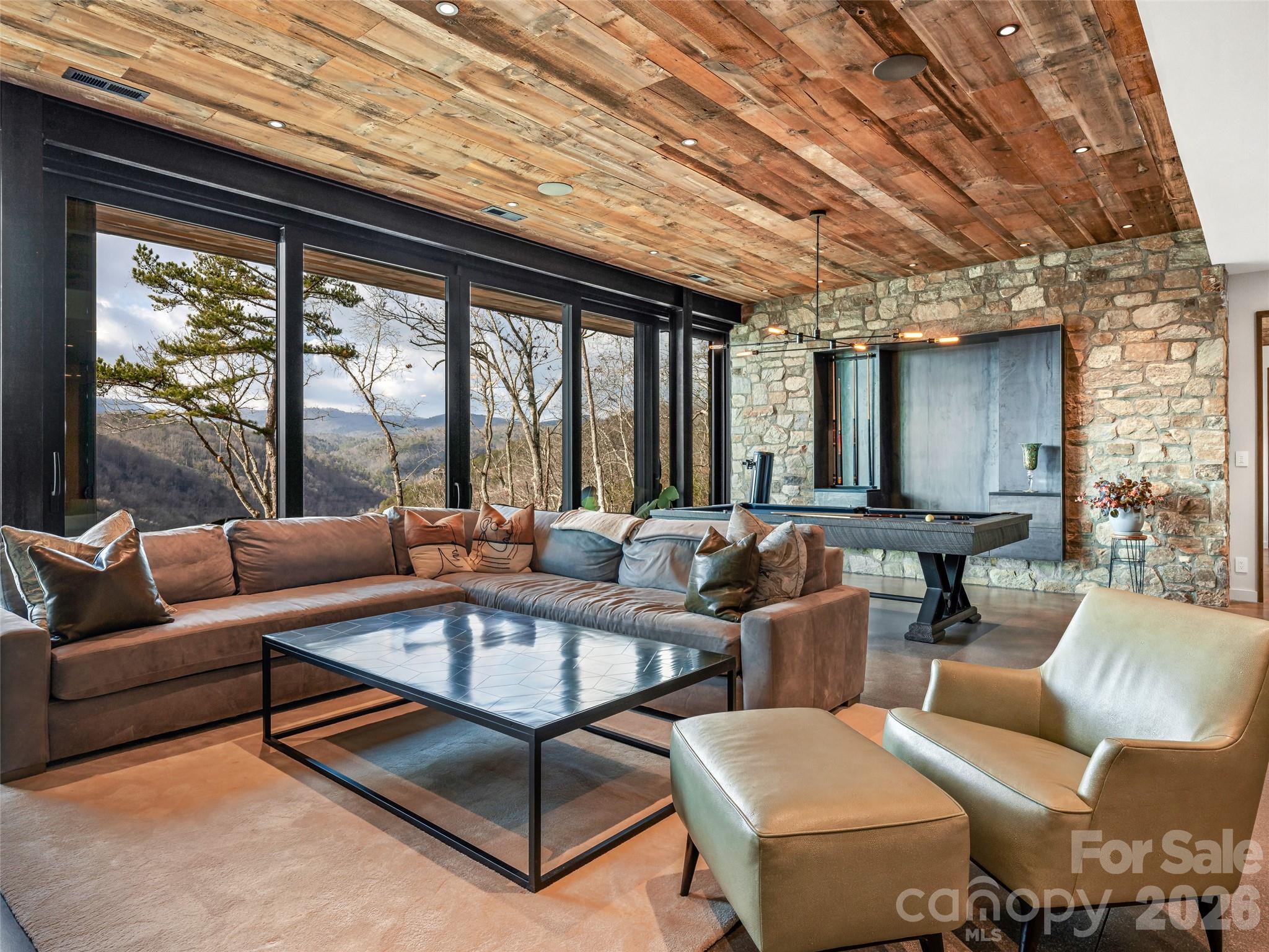112 Moon Shadow Lane Marshall, NC 28753 - Photo 30 of 48 a living room with furniture and a large window