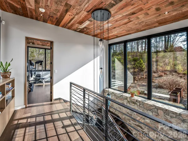 a view of parking garage with cars