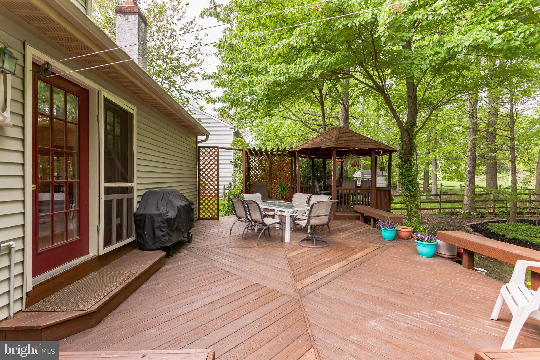 178 Flint Road Langhorne, PA 19047 - Photo 14 of 25 Expansive deck with gazebo off family room