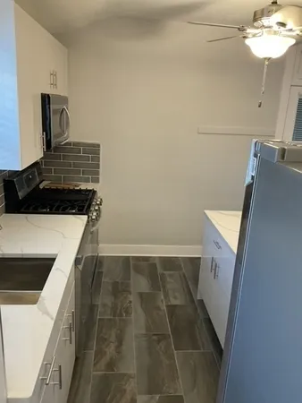 a view of a kitchen from the kitchen