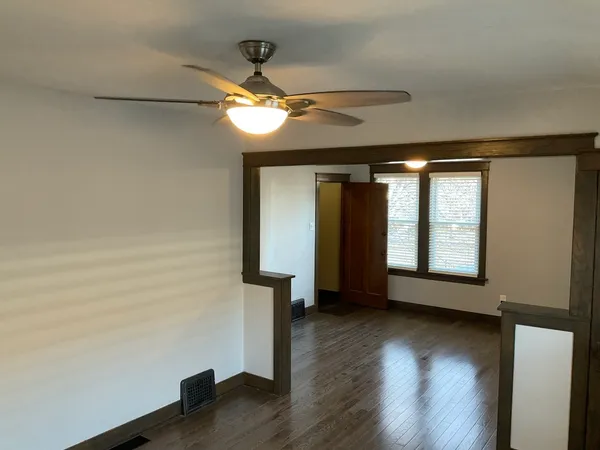 a view of entryway with wooden floor