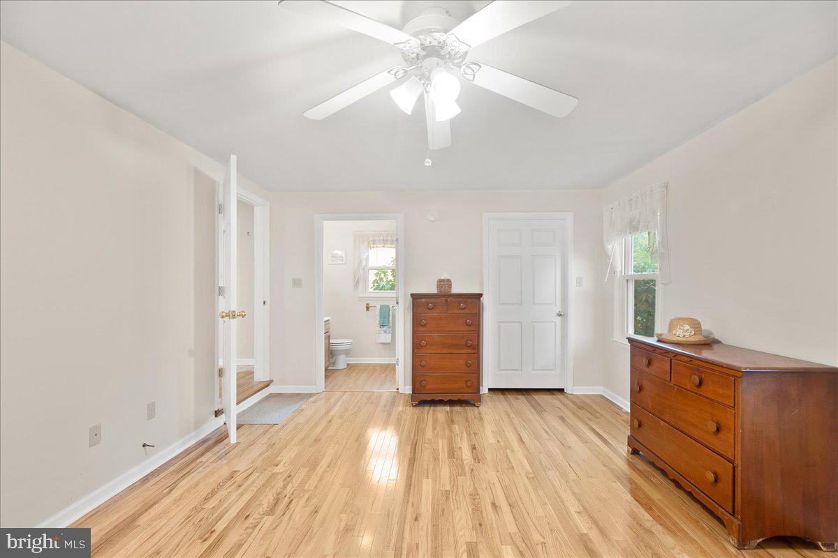24524 Fullbrook Lane Dames Quarter, MD 21821 - Photo 21 of 45 wooden floor in an empty room with a window