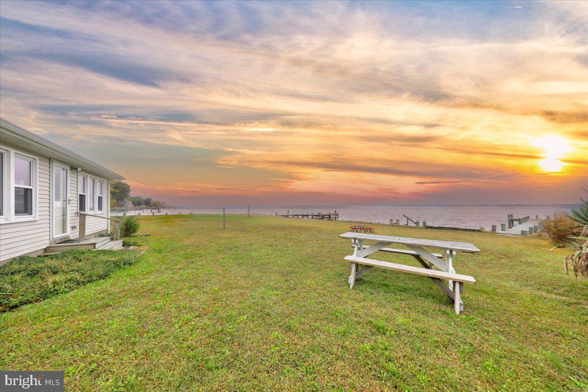 24524 Fullbrook Lane Dames Quarter, MD 21821 - Photo 44 of 45 a view of a lake with a terrace