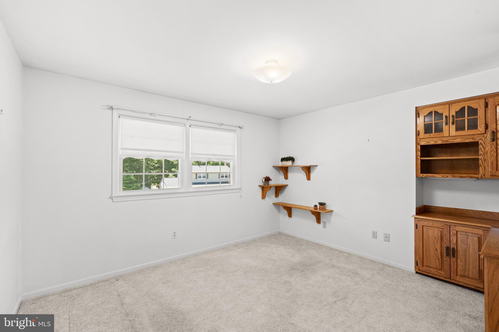 6703 Red Jacket Road Springfield, VA 22152 - Photo 23 of 31 3rd BR/Multi purpose room HW floors under carpet
