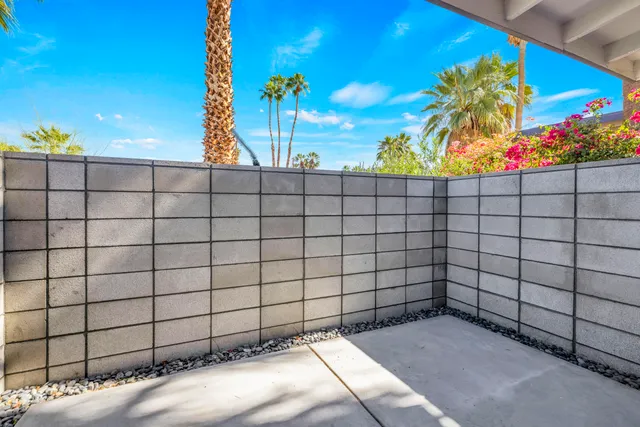 a view of houses with a street