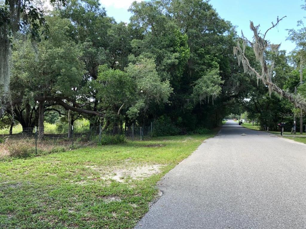 2802 Cleburne Road Orlando, FL 32817 - Photo 1 of 1 a view of outdoor space with deck and yard