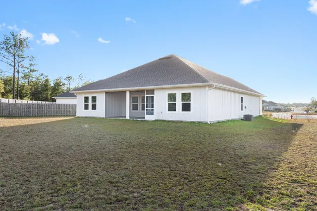 a view of house outdoor space and yard