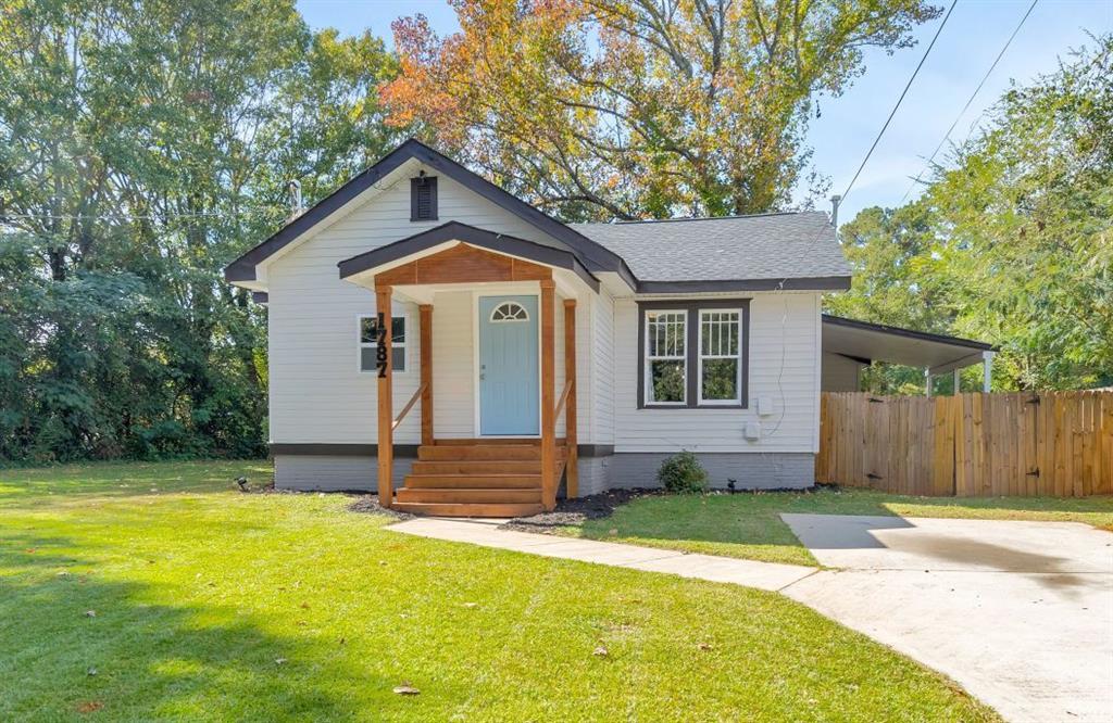 1787 Lynn Lane Decatur, GA 30032 - Photo 1 of 1 a front view of a house with a yard