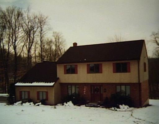 347 Old Zoar Road Monroe, CT 06468 - Photo 1 of 1 a front view of a house with a yard