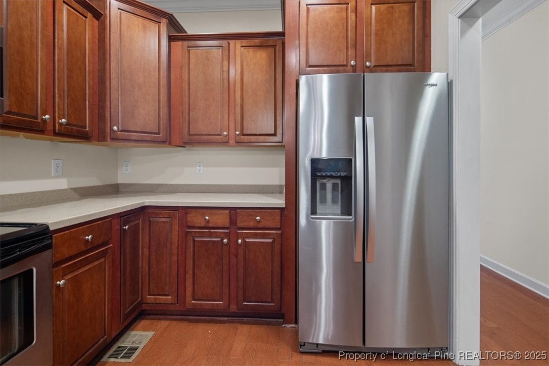 930 Westland Ridge Road Fayetteville, NC 28311 - Photo 12 of 50 a kitchen with stainless steel appliances granite countertop a refrigerator and a sink