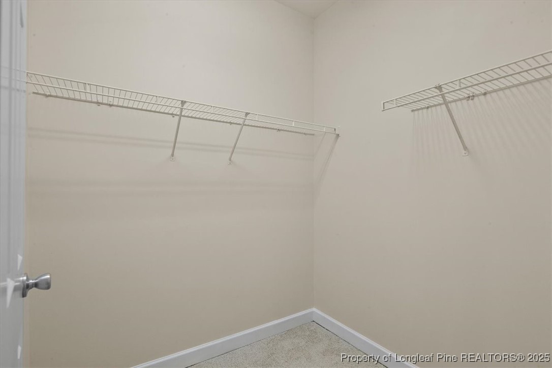 930 Westland Ridge Road Fayetteville, NC 28311 - Photo 30 of 50 a view of a room with racks on the wall