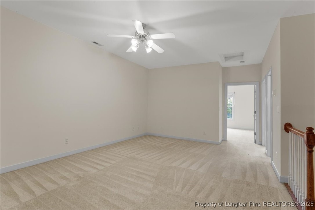 930 Westland Ridge Road Fayetteville, NC 28311 - Photo 34 of 50 a view of an empty room with a chandelier fan