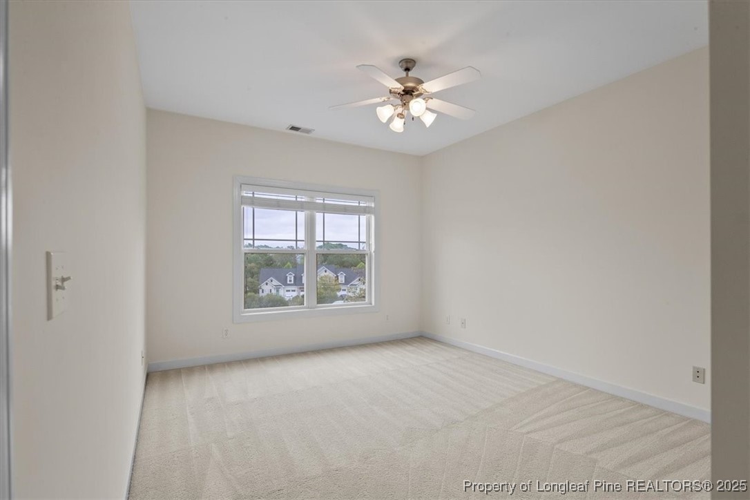 930 Westland Ridge Road Fayetteville, NC 28311 - Photo 41 of 50 a view of an empty room with a window
