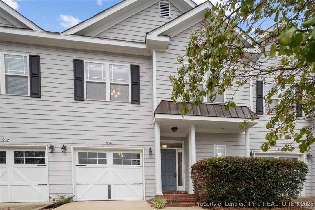 930 Westland Ridge Road Fayetteville, NC 28311 - Photo 6 of 50 a front view of a house with a tree