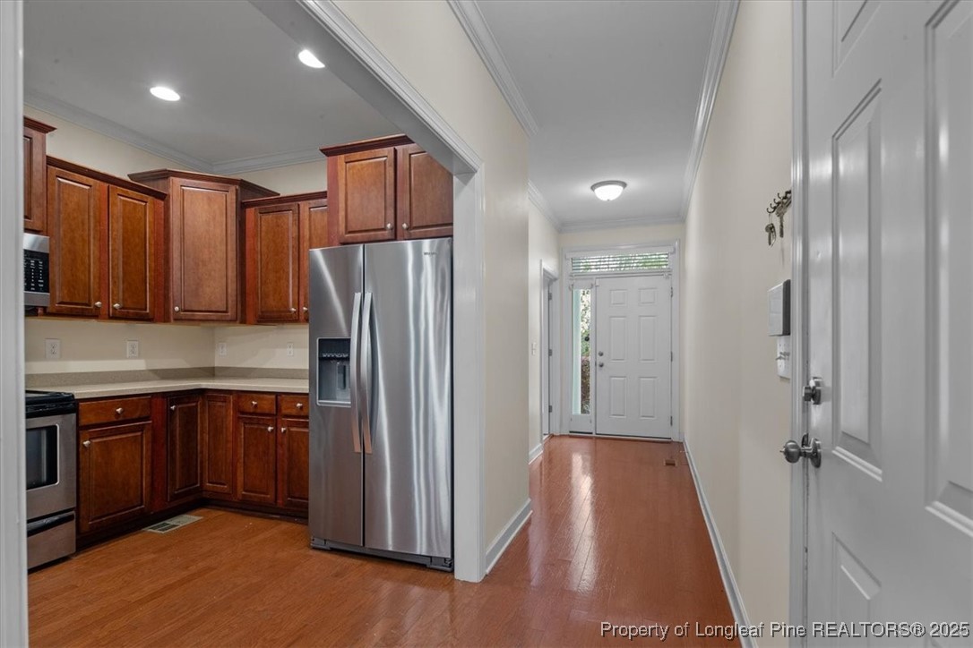 930 Westland Ridge Road Fayetteville, NC 28311 - Photo 8 of 50 a kitchen with stainless steel appliances granite countertop a refrigerator and a sink