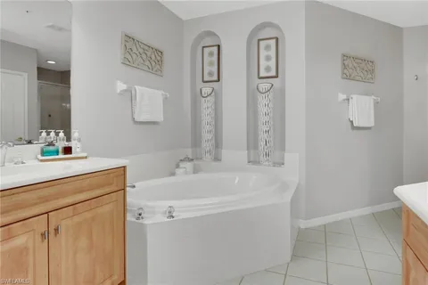 a bathroom with a sink a vanity and a toilet