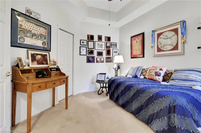 a bedroom with bed and furniture