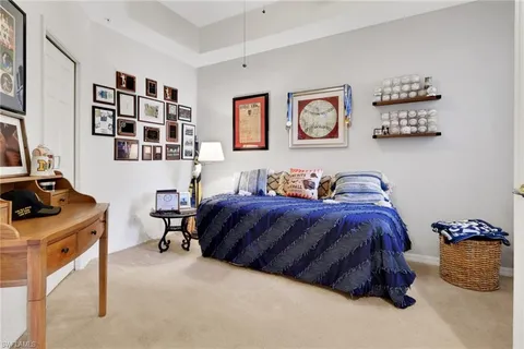 a bedroom with a bed and furniture