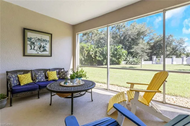 a living room with a couch and a table