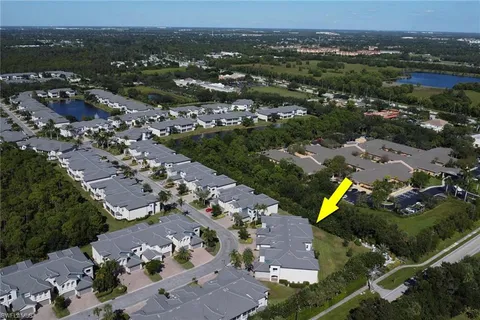 an aerial view of a city with lots of residential buildings