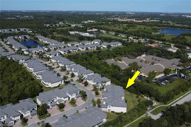 an aerial view of a city with lots of residential buildings