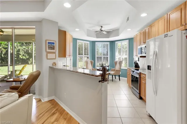 a very nice looking living room with a large window