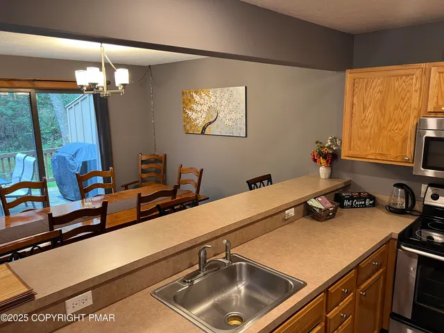 a room with gym equipment and a large window