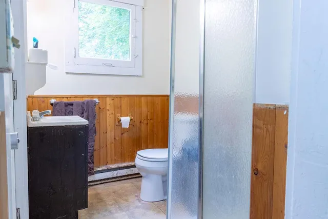 a bathroom with a sink and a toilet