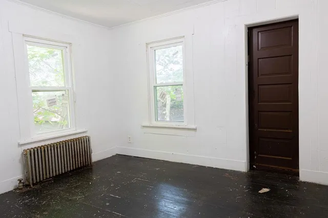 an empty room with windows