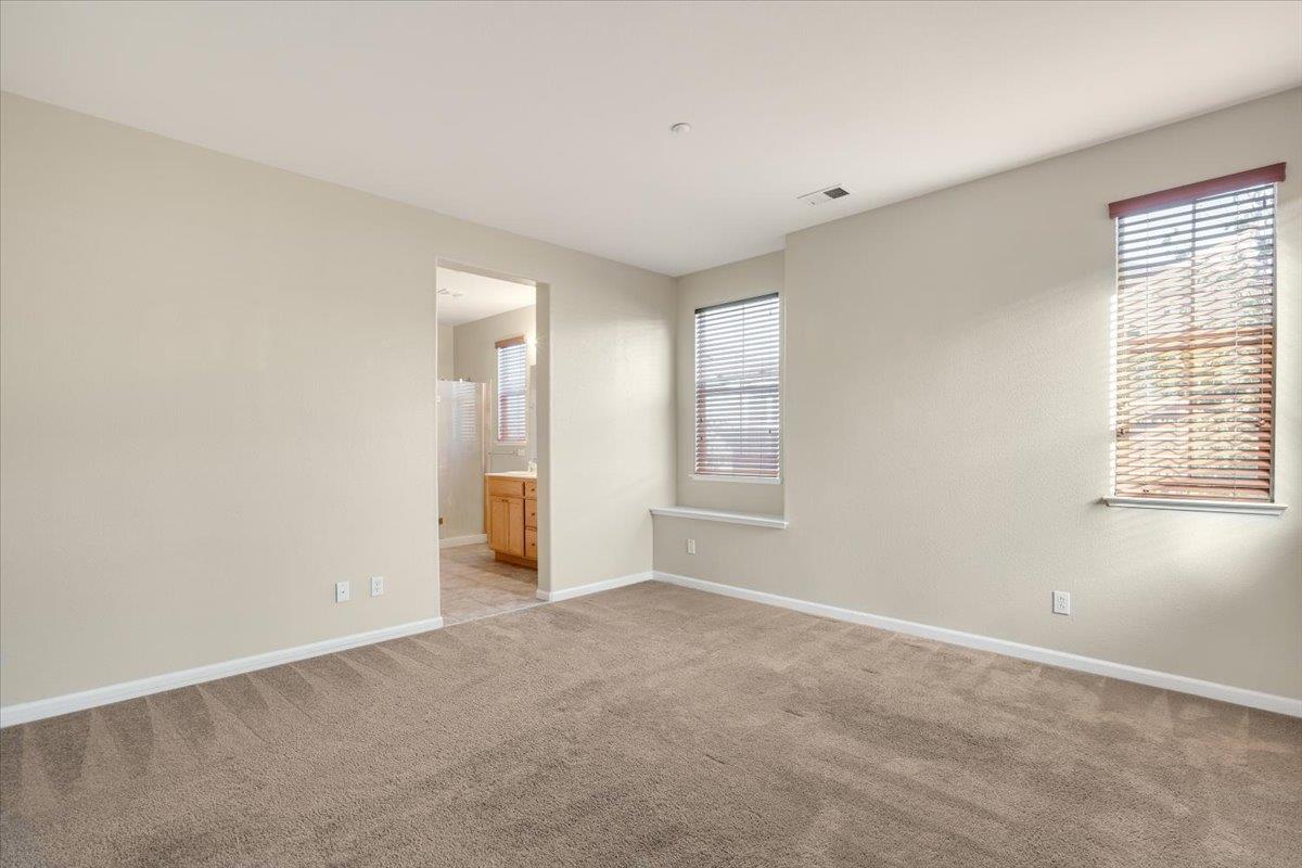 7835 Dickens Way Gilroy, CA 95020 - Photo 9 of 16 an empty room with windows