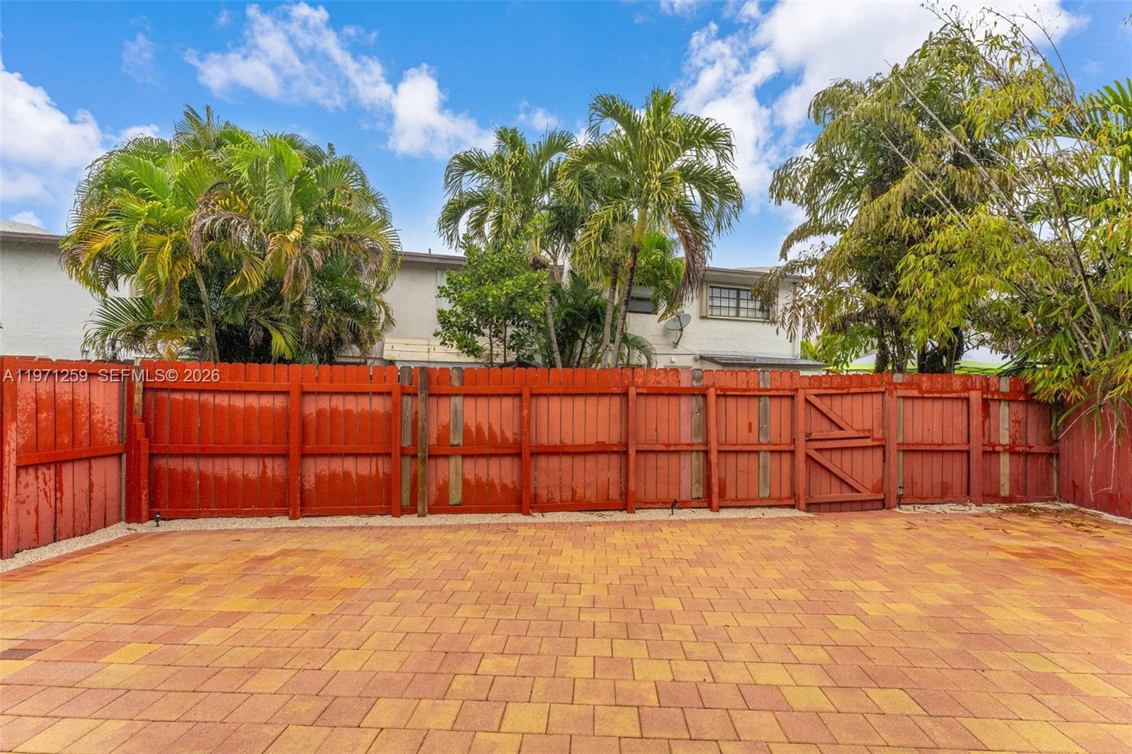 10915 Southwest 71st Street Miami, FL 33173 - Photo 27 of 33 a view of a backyard