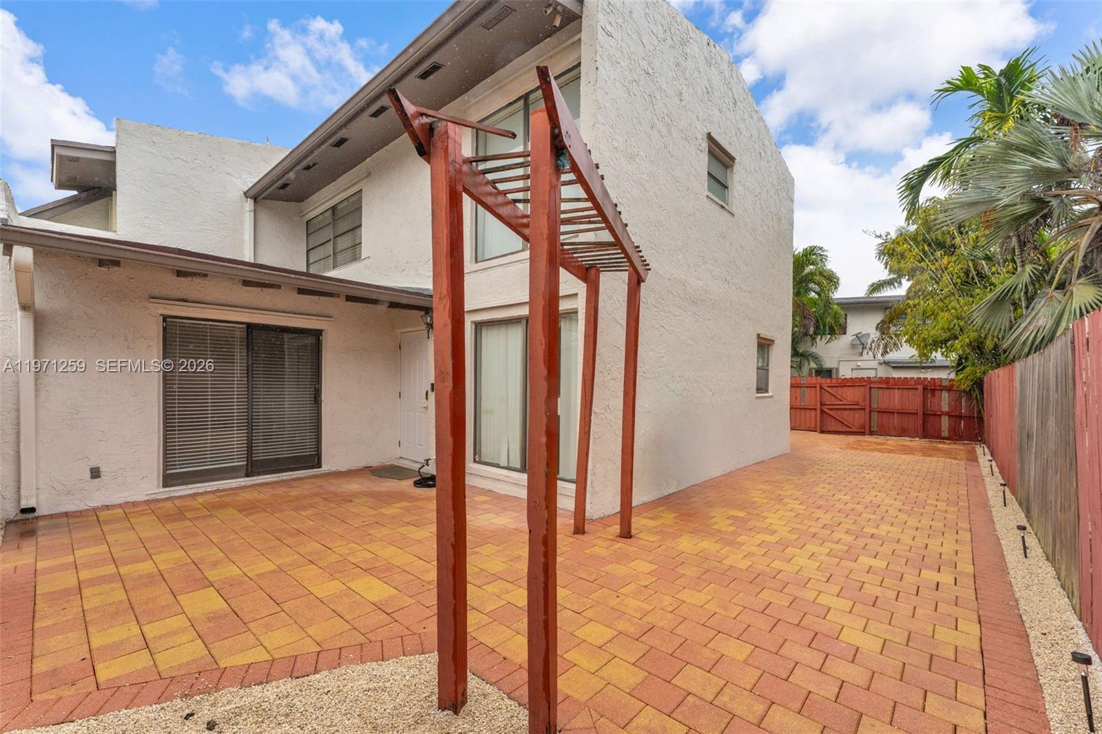 10915 Southwest 71st Street Miami, FL 33173 - Photo 28 of 33 a view of a house with a large window