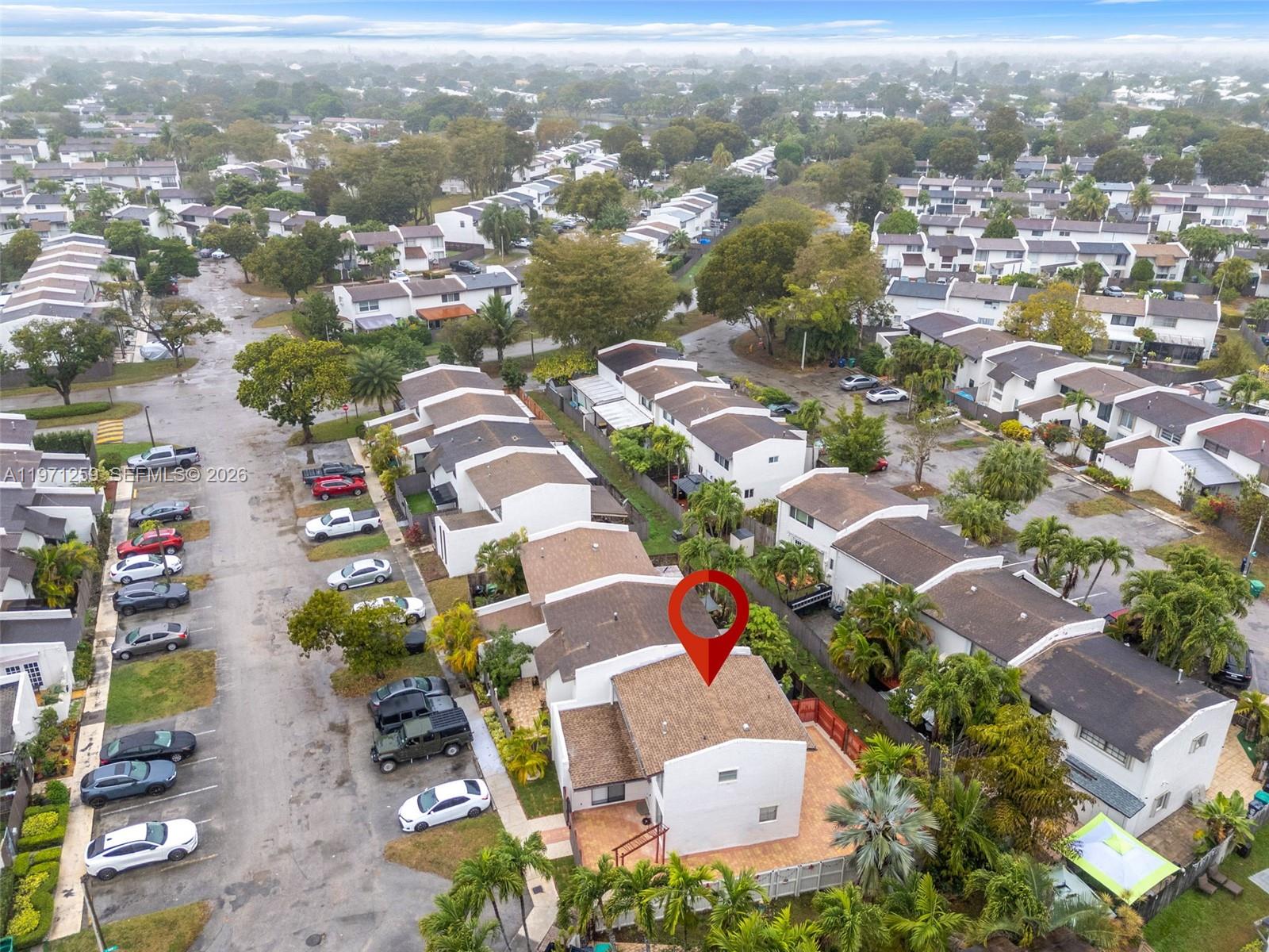 10915 Southwest 71st Street Miami, FL 33173 - Photo 5 of 33 an aerial view of residential houses with outdoor space