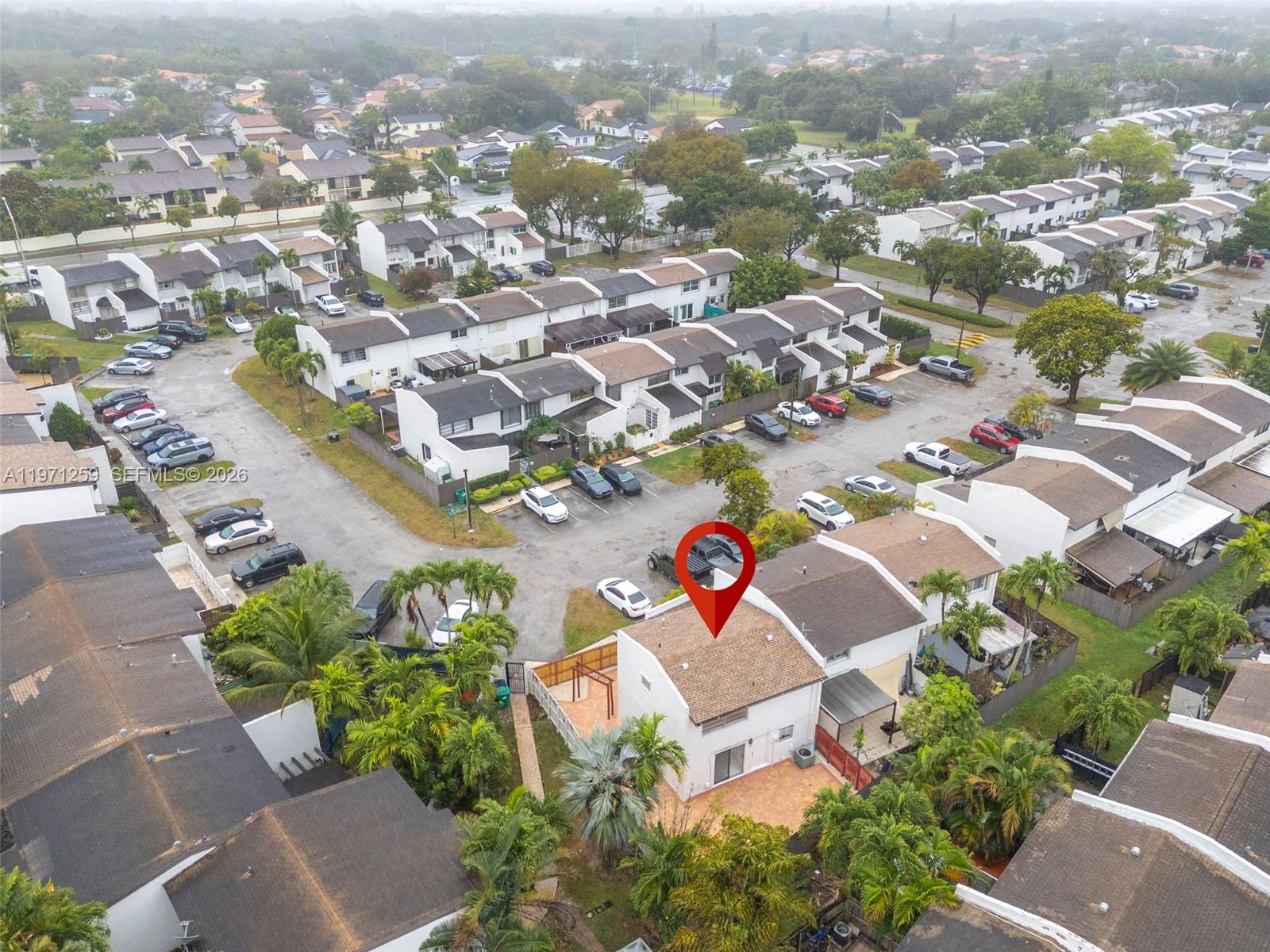 10915 Southwest 71st Street Miami, FL 33173 - Photo 6 of 33 an aerial view of residential houses with outdoor space