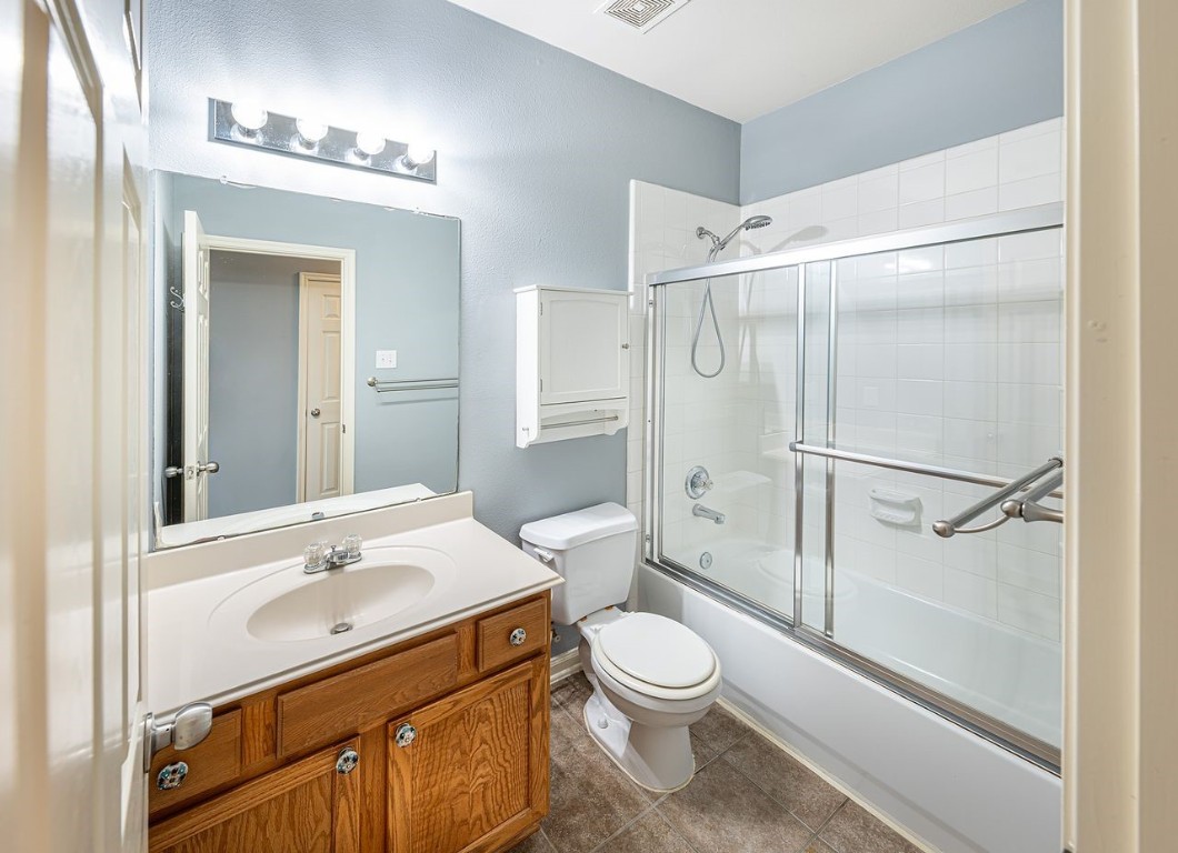 22715 Imperial Ivy Court Spring, TX 77373 - Photo 17 of 45 a bathroom with a sink a toilet and shower
