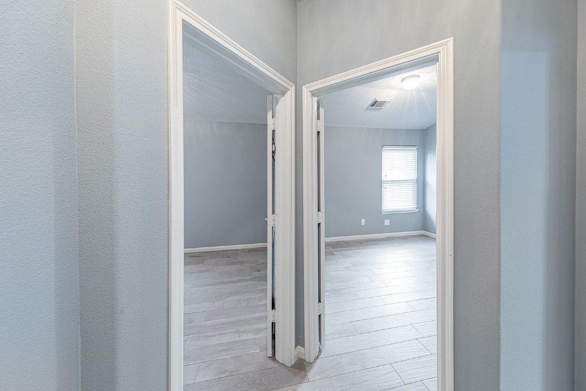 22715 Imperial Ivy Court Spring, TX 77373 - Photo 22 of 45 a view of a hallway