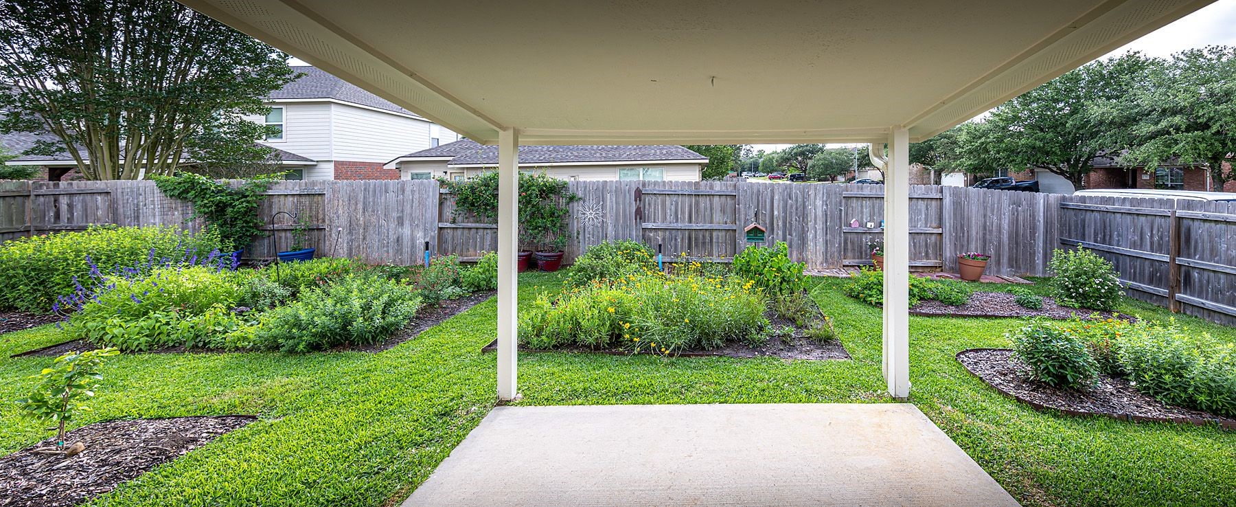 22715 Imperial Ivy Court Spring, TX 77373 - Photo 37 of 45 a view of a backyard with plants