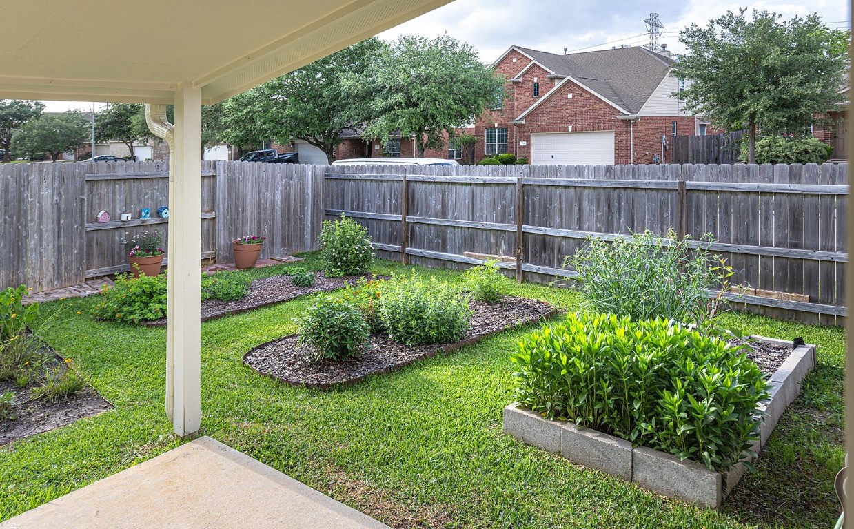 22715 Imperial Ivy Court Spring, TX 77373 - Photo 38 of 45 a view of a backyard with garden