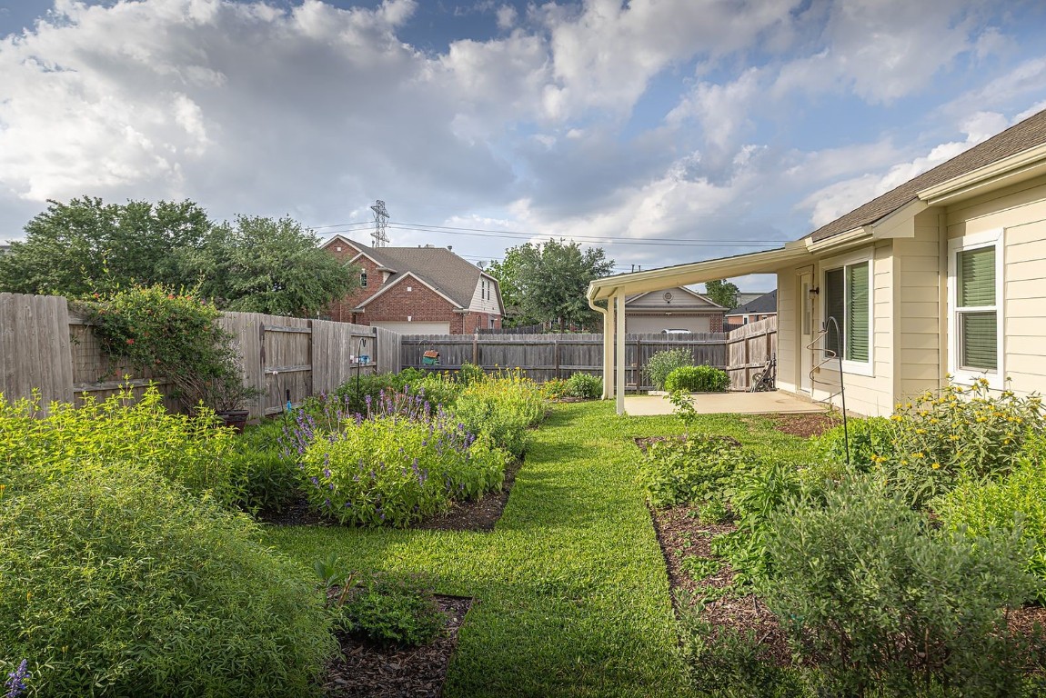 22715 Imperial Ivy Court Spring, TX 77373 - Photo 44 of 45 a view of a garden in front of a house
